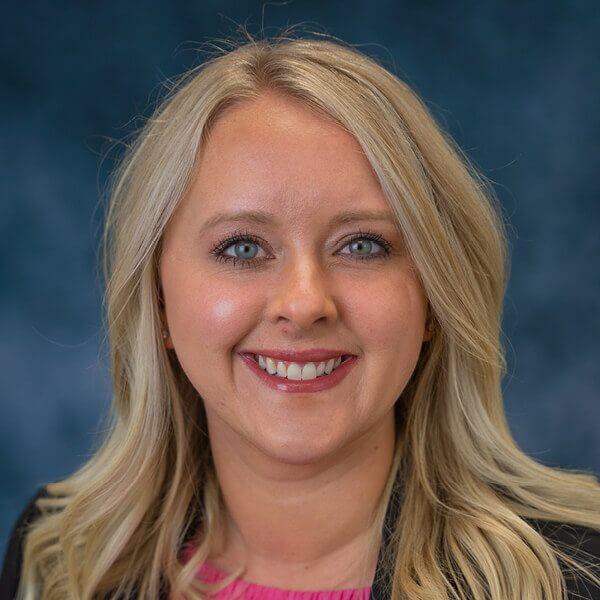 Smiling headshot photo of a woman named Meliea Ware.